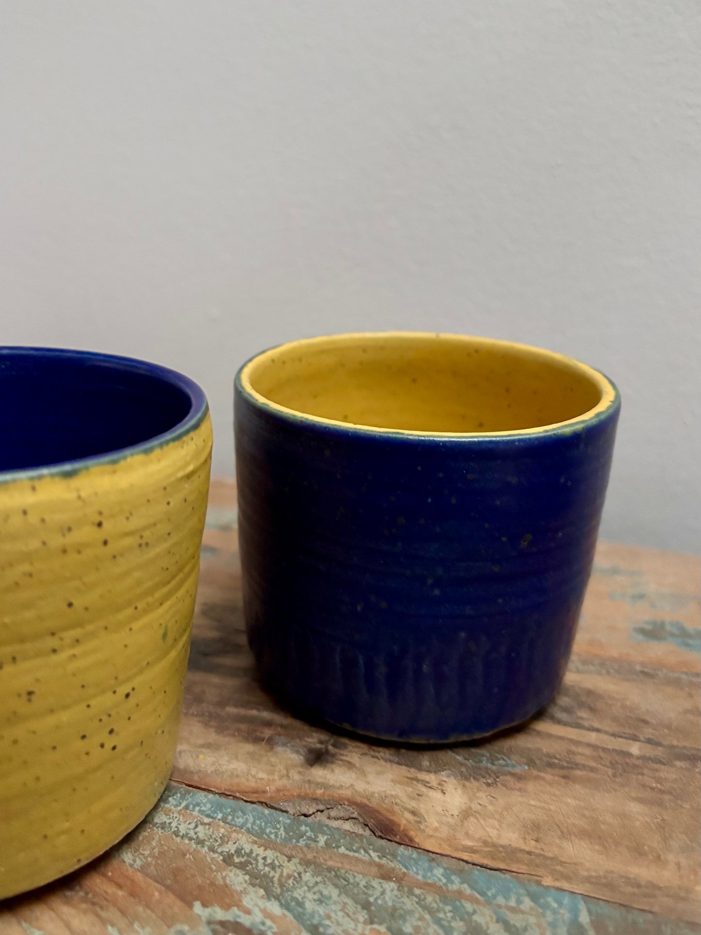 small cups - yellow and blue