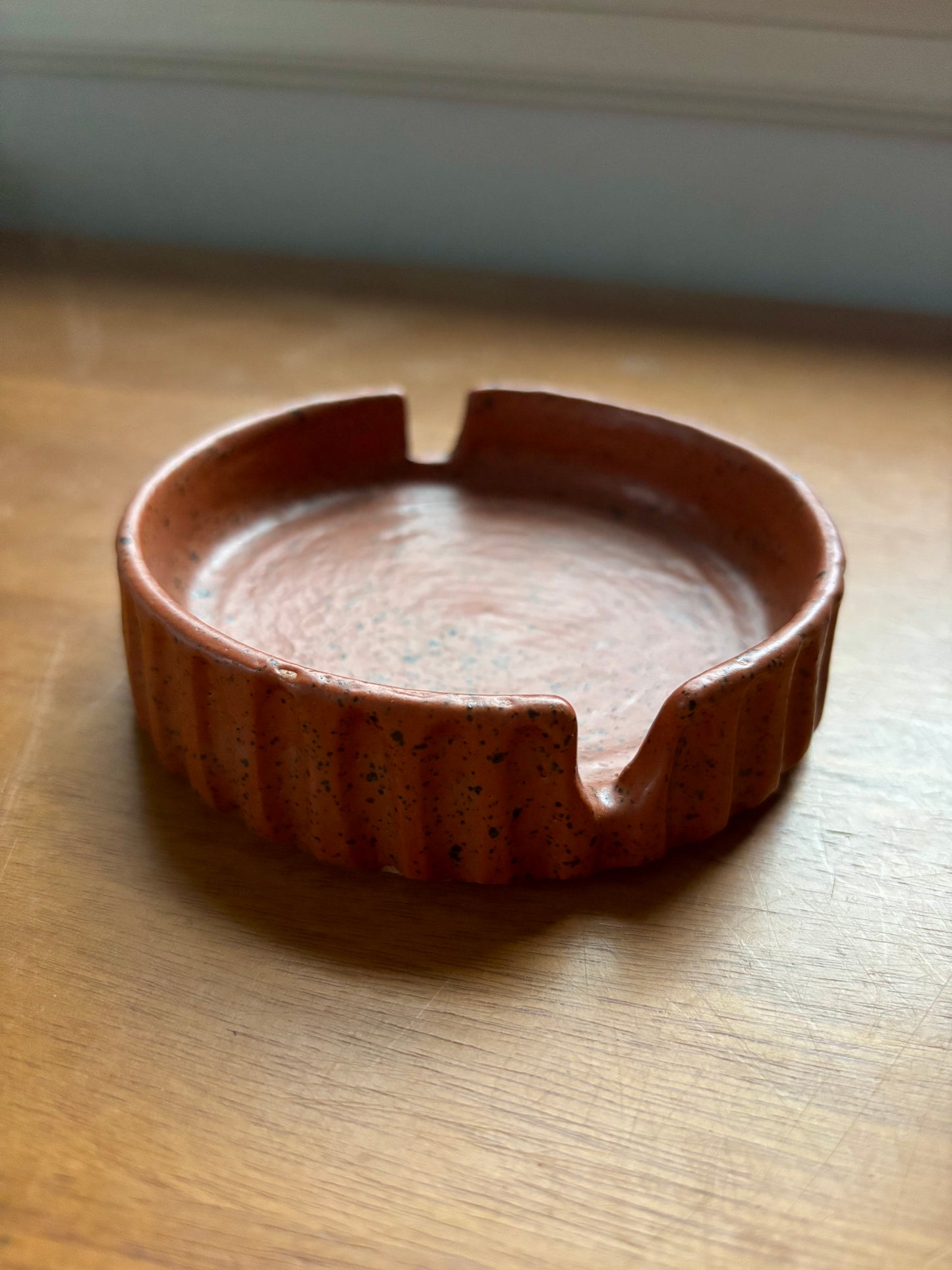 ash tray - carved rust