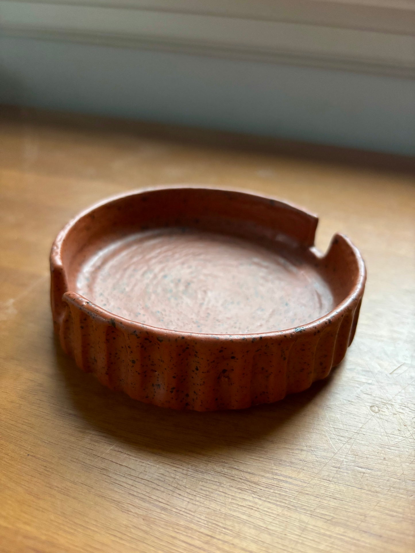 ash tray - carved rust